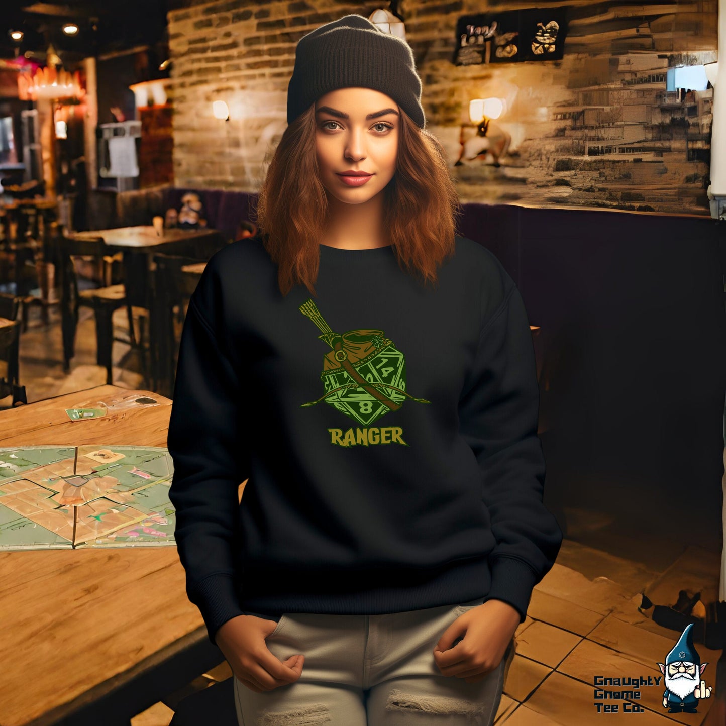 a woman wearing a black sweatshirt with a green graphic on it